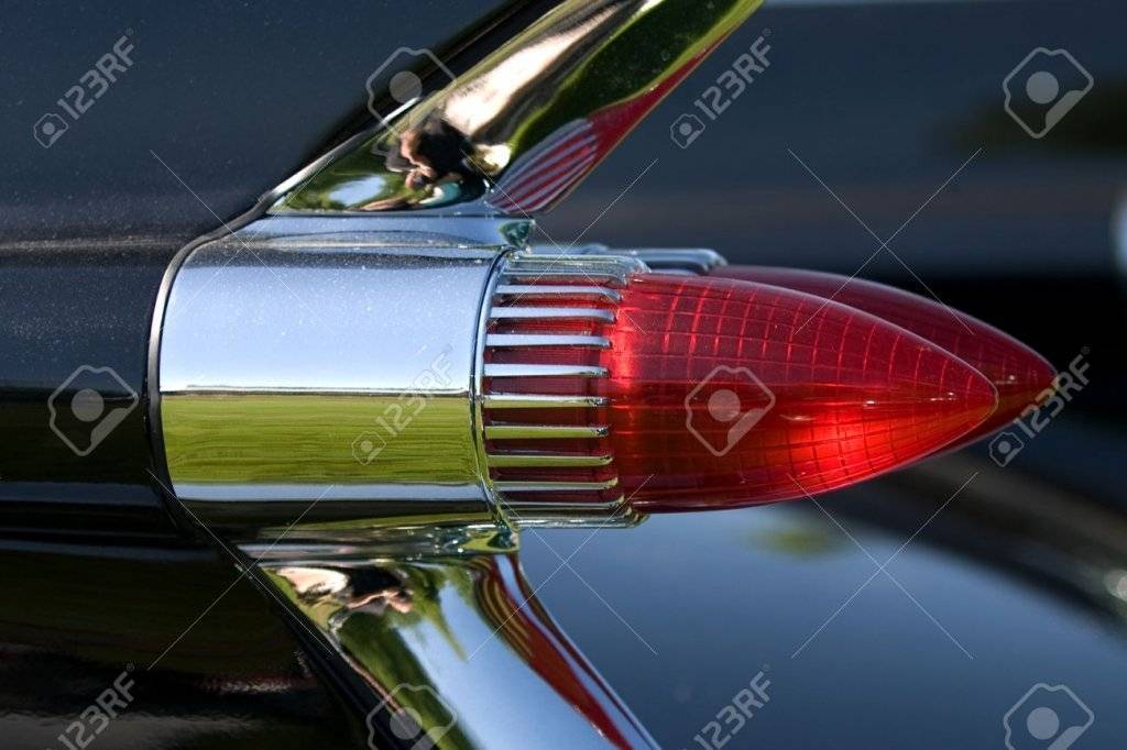 10052327-The-tail-lights-on-a-vintage-Cadillac-Fleetwood--Stock-Photo-car-classic.jpg