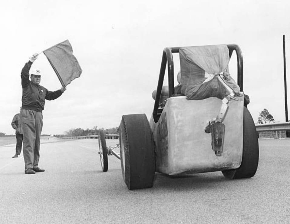 1962.Drag races being held on the DIS backstretch.jpg