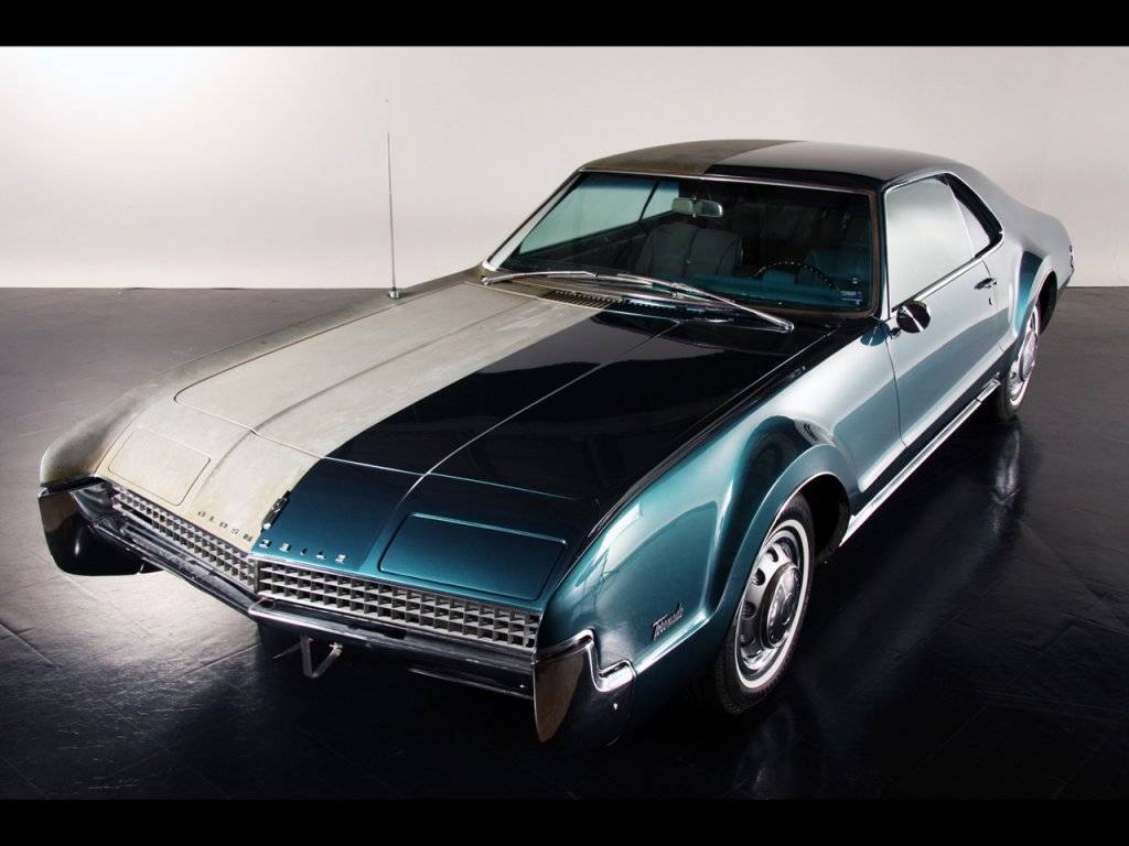 1967-Oldsmobile-Toronado-Half-and-Half-by-Precision-Restorations-Front-Angle-2-1280x960.jpg