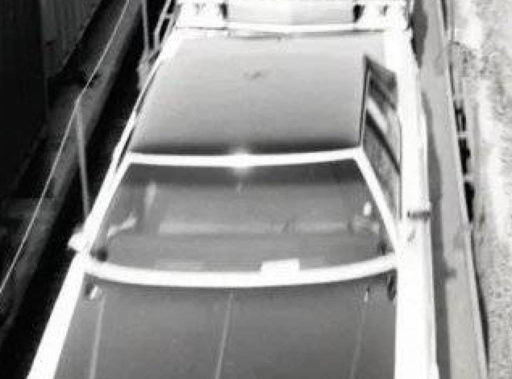 1974 Plymouth Fury Cop Car on Train.jpg