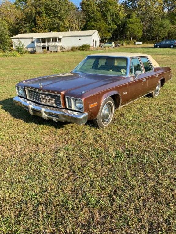 1977 Plymouth Gran Fury 360 77k 4dr Sdn Bronze Vinyl.001.jpg