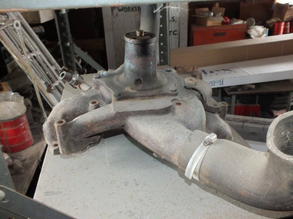 413 Motor Home water pump housing.JPG