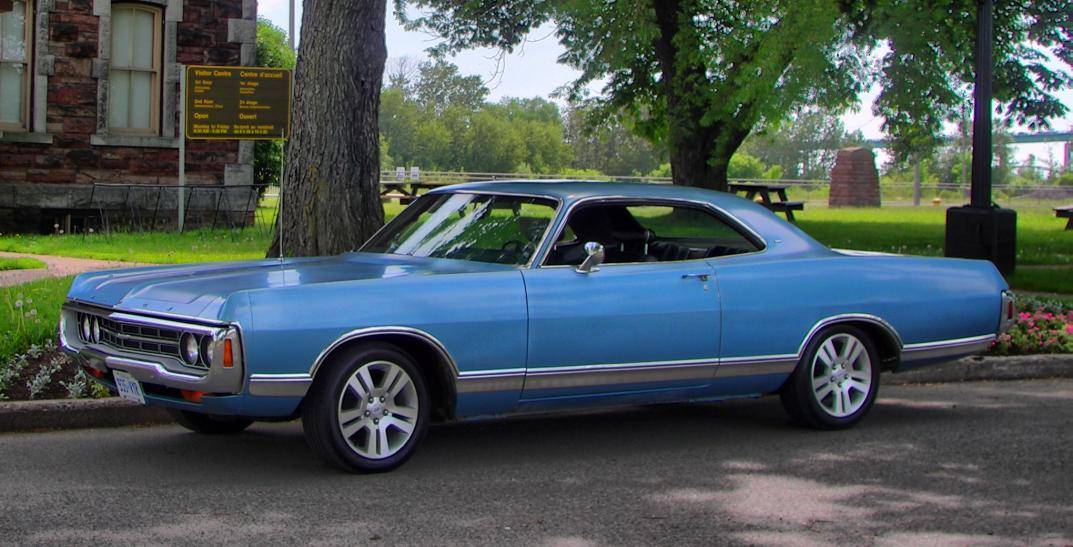 70 Monaco in Front of the Soo Locks Block House.jpg