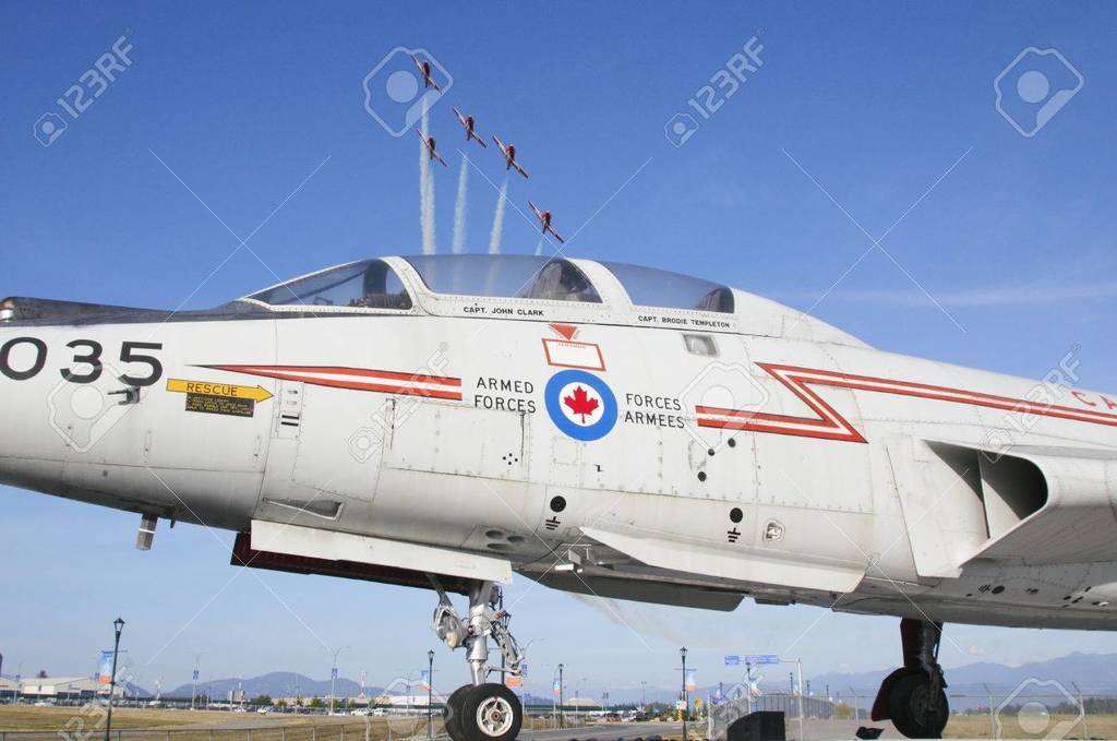 aerobatic-canadian-snowbirds-fly-over-a-vintage-royal-canadian-air-force-f-101-voodoo-supersonic.jpg