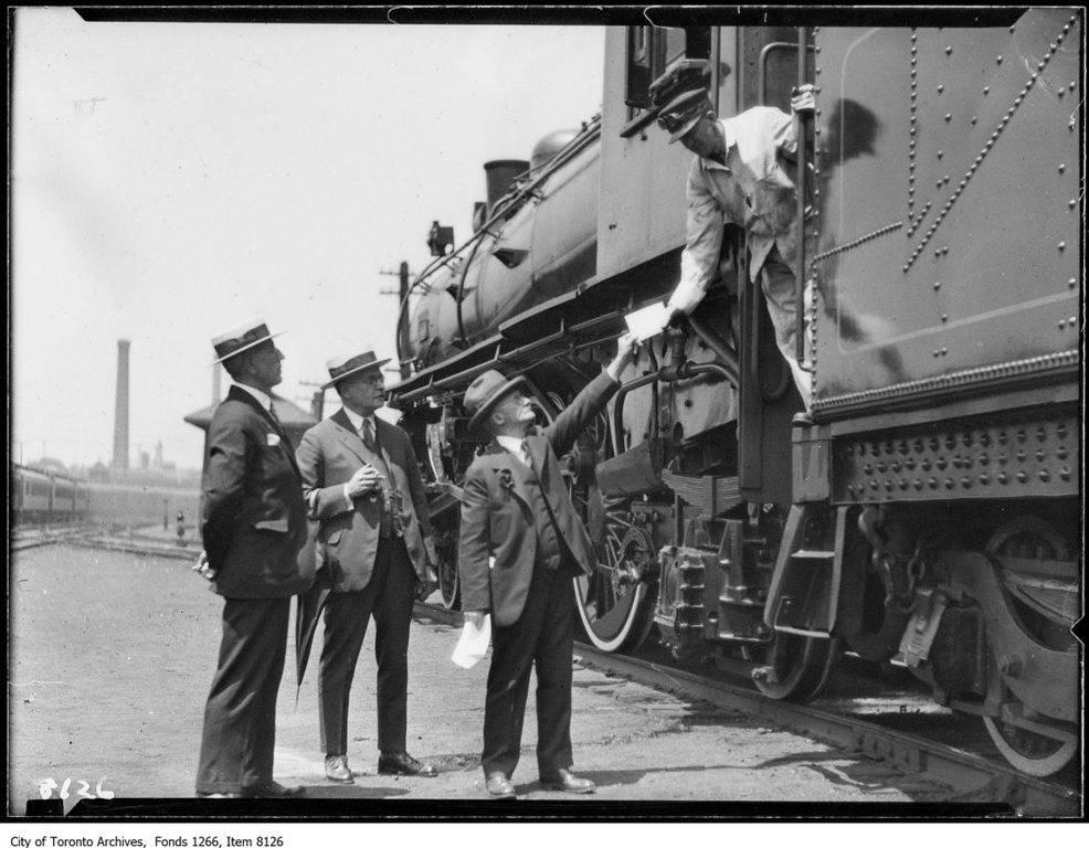 C.P.R.-new-Montreal-train-officials-engineer-handing-letter-july-28-1926.jpg