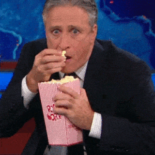 Jon-Stewart-Eating-Popcorn-320x320.gif