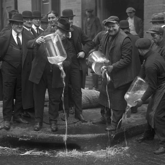 men-pouring-liquor-into-street-during-prohibition.jpg