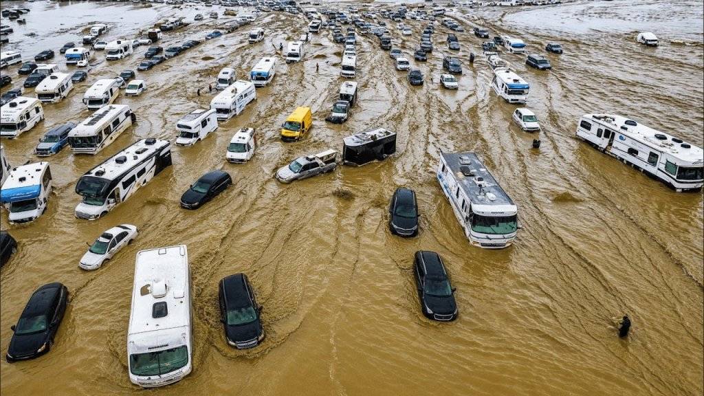 MORE Chaos at Burning Man! Torrential Rains Turn Playa Into Mud Pit.001.jpg