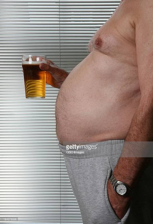 obese-man-with-beer-glass-picture-id184078536.jpg