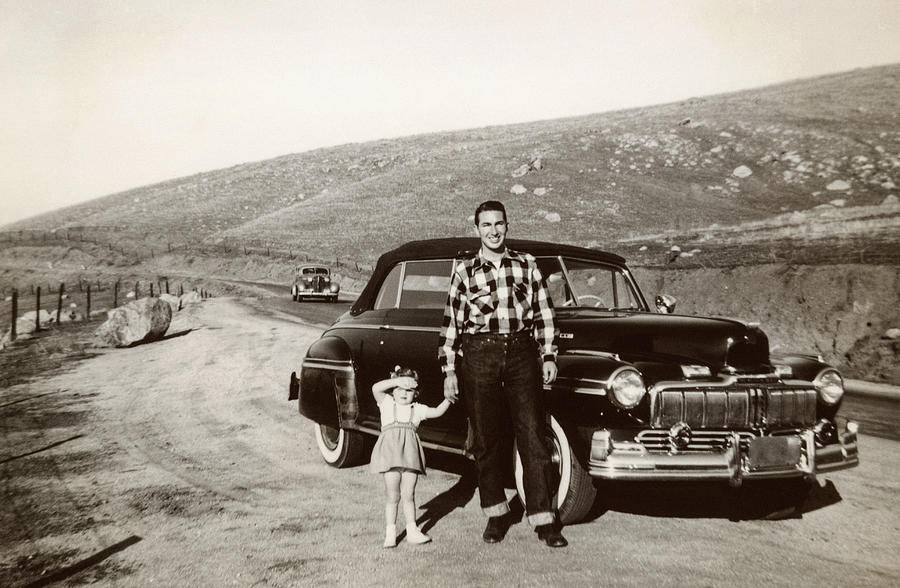 portrait-of-caucasian-father-and-daughter-posing-near-vintage-car-pbnj-productions.jpg