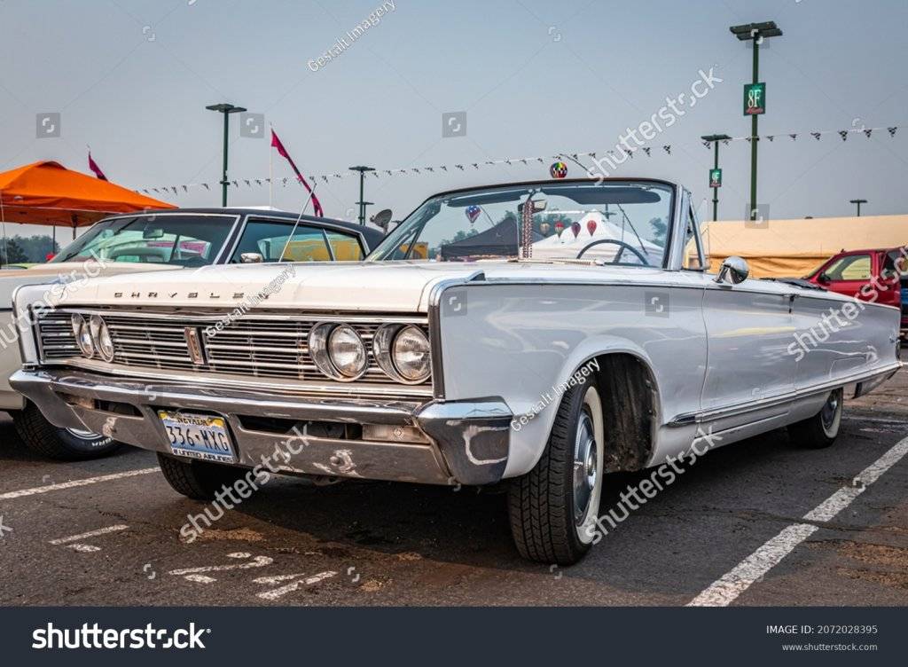 stock-photo-reno-nv-august-chrysler-newport-convertible-at-a-local-car-show-2072028395.jpg
