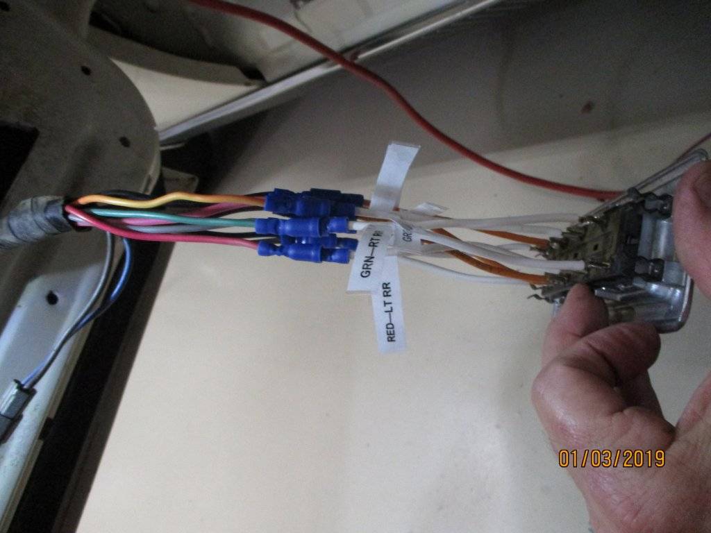 Switch connected to wiring harness in door.JPG