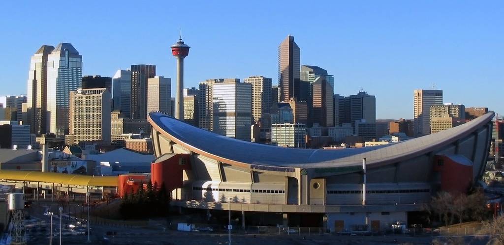 the-saddledome-and-the-skyline-with-towers-in-calgary-alberta-canada.jpg