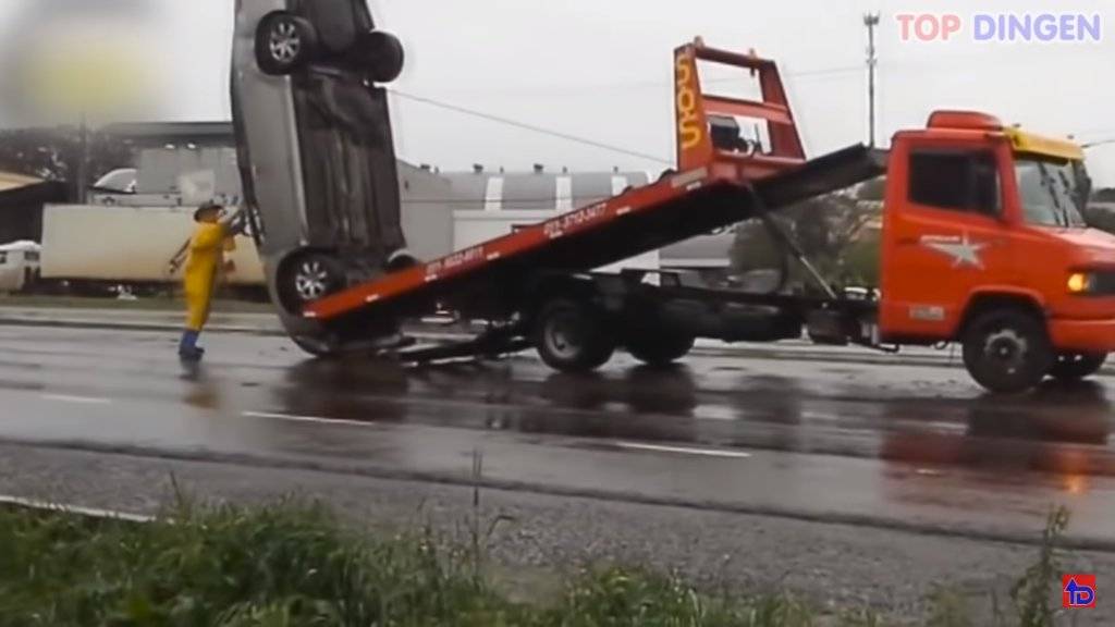 Top 50 IDIOTS at WORK.Tow.Truck.jpg