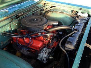 Partially cleaned up engine bay with radiator.jpg